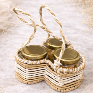 Heart-shaped basket with jars of nuts