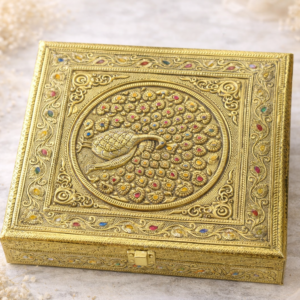 Intricate gold box with peacock